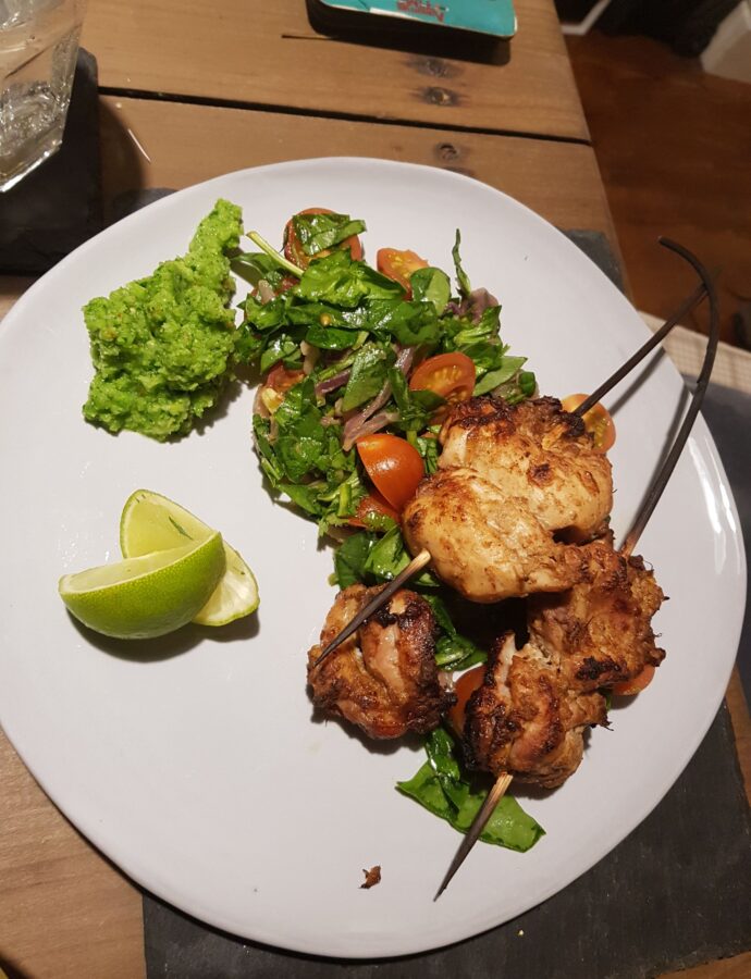 Chicken skewers, tomato and spinach salsa and pea chutney