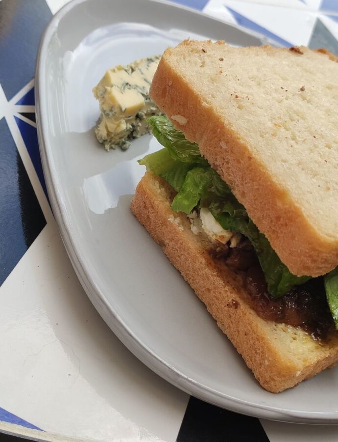 Pork shoulder with citrus, maple and pomegranate sauce